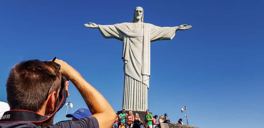 Christ the Redeemer Entry Ticket by Corcovado Train - Reaching Christ the Redeemer above Rio