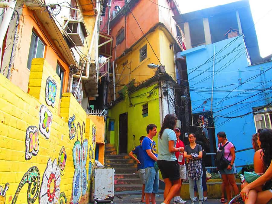 Discover Rocinha: Guided Tour of the Famous Favela - Winding alleys, painted walls, and local stories