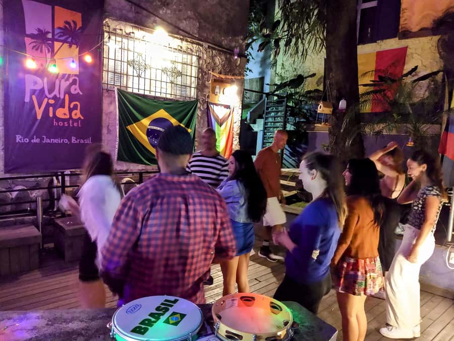 Rio: Caipirinha Workshop and Samba Class - Mixing two caipirinhas behind the bar