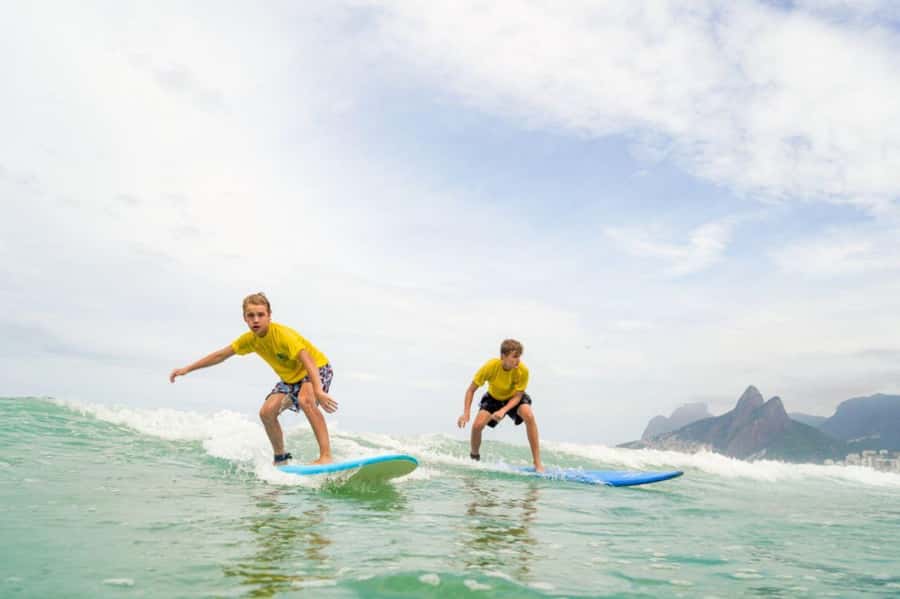 Surf lessons: in Arpoador in Ipanema. - The sunset factor at Arpoador
